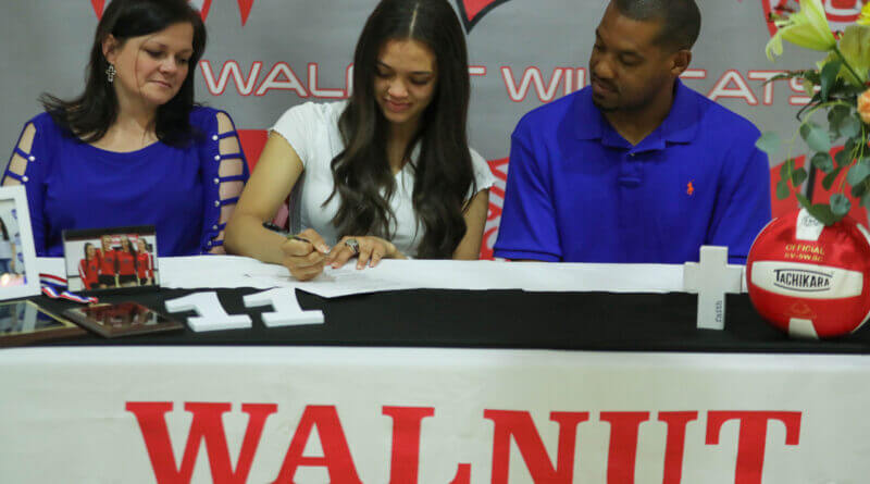Elyse Story becomes first Lady Wildcat to sign volleyball scholarship